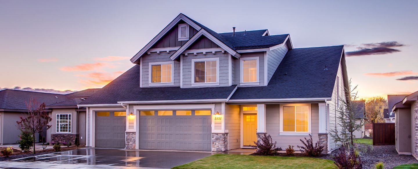 blue house with attic during twilight valley stream ny